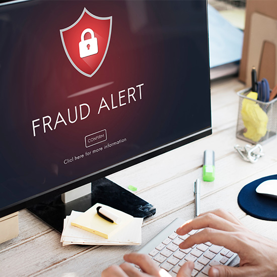 Fraud alert popup on computer screen